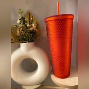 24 oz red studded Starbucks cup